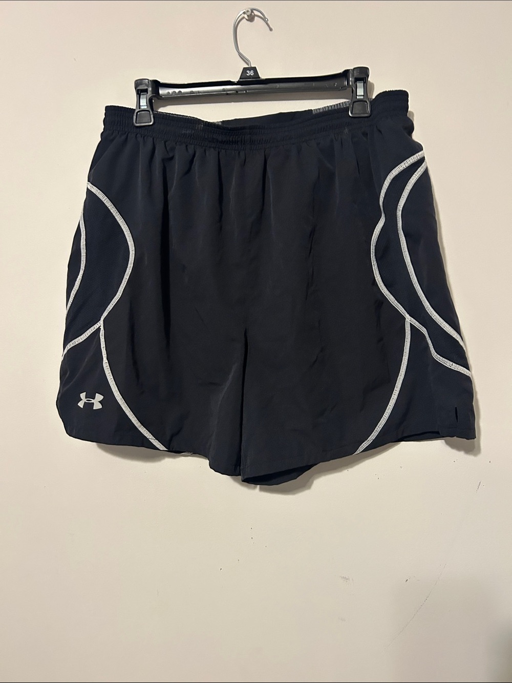 Lot of three Under Armour Black men’s Athletic Shorts and 2 black shirts